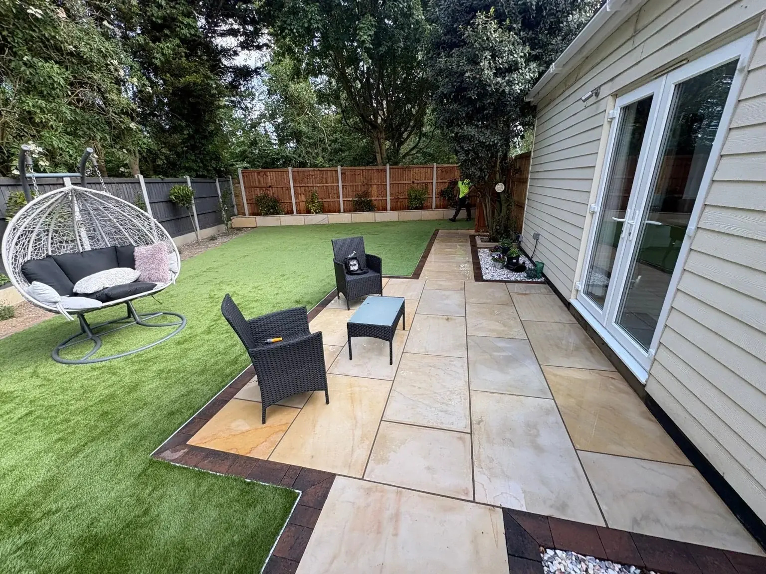 ABL garden project with stone paving, lawn and outdoor seating